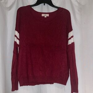 Red and white jersey sweater size medium/large